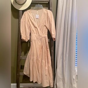 Gorgeous Free People wrap dress. NWT in size XS.
